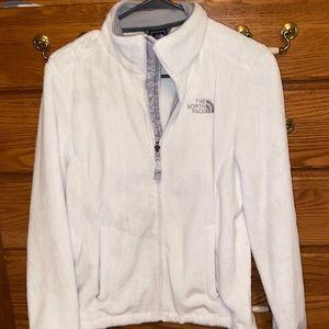 White furry north face women’s jacket